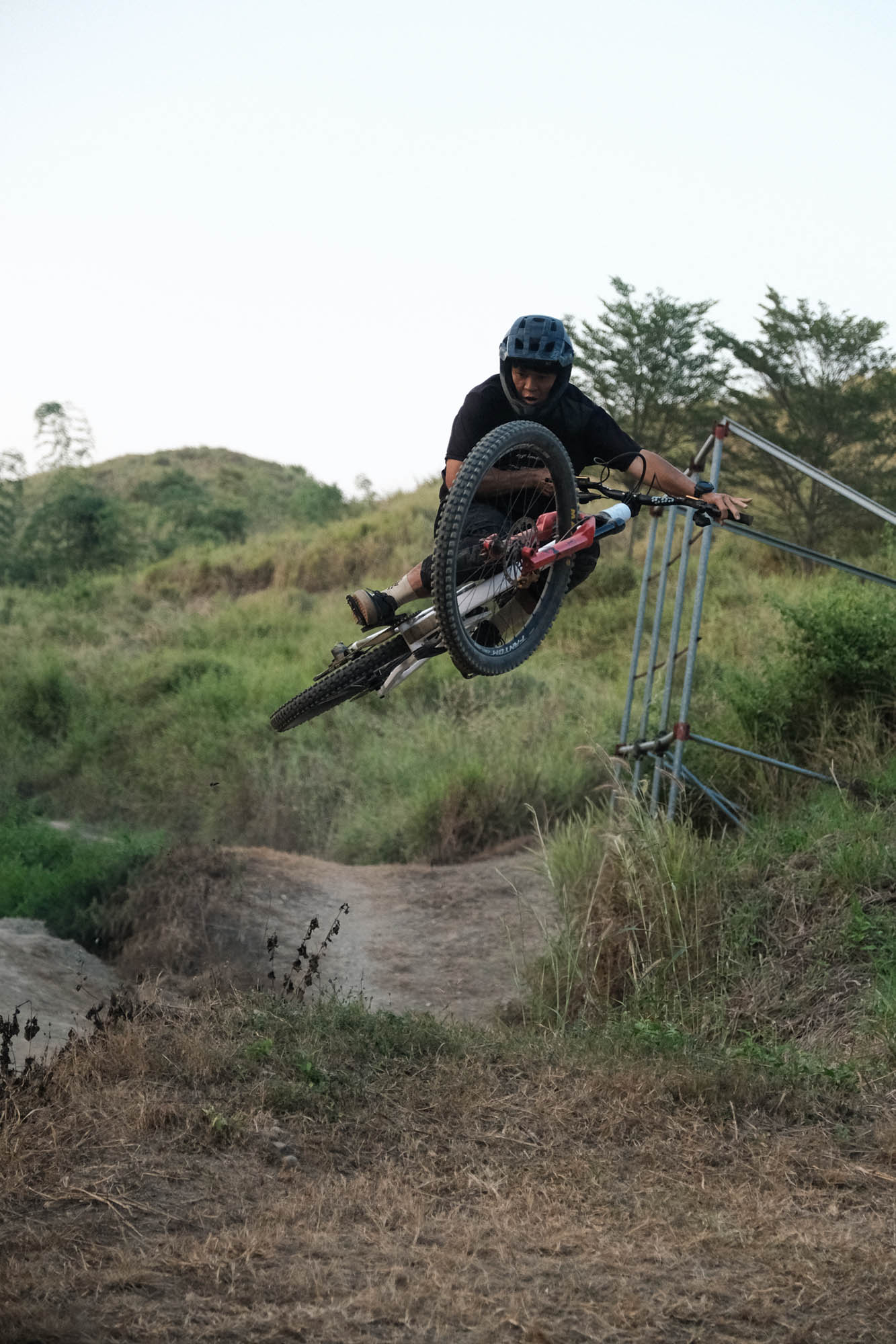 Ajax performing a mountain bike jump
